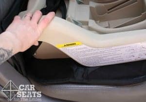 This seat protector restricts access to the lower anchors