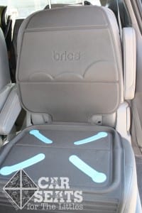 Rigid, thick seat protector -- not approved for a safe car seat installation.