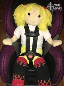 3 year old Huggable Images doll wearing a diaper cover to protect a car seat during toilet training
