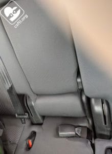 Forward of the bight seatbelt
