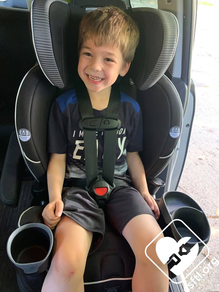 boy in car seat