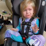Toddler crying in car seat