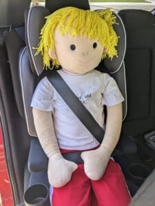 Safety 1st Comfort Ride high back booster mode 6 year old doll